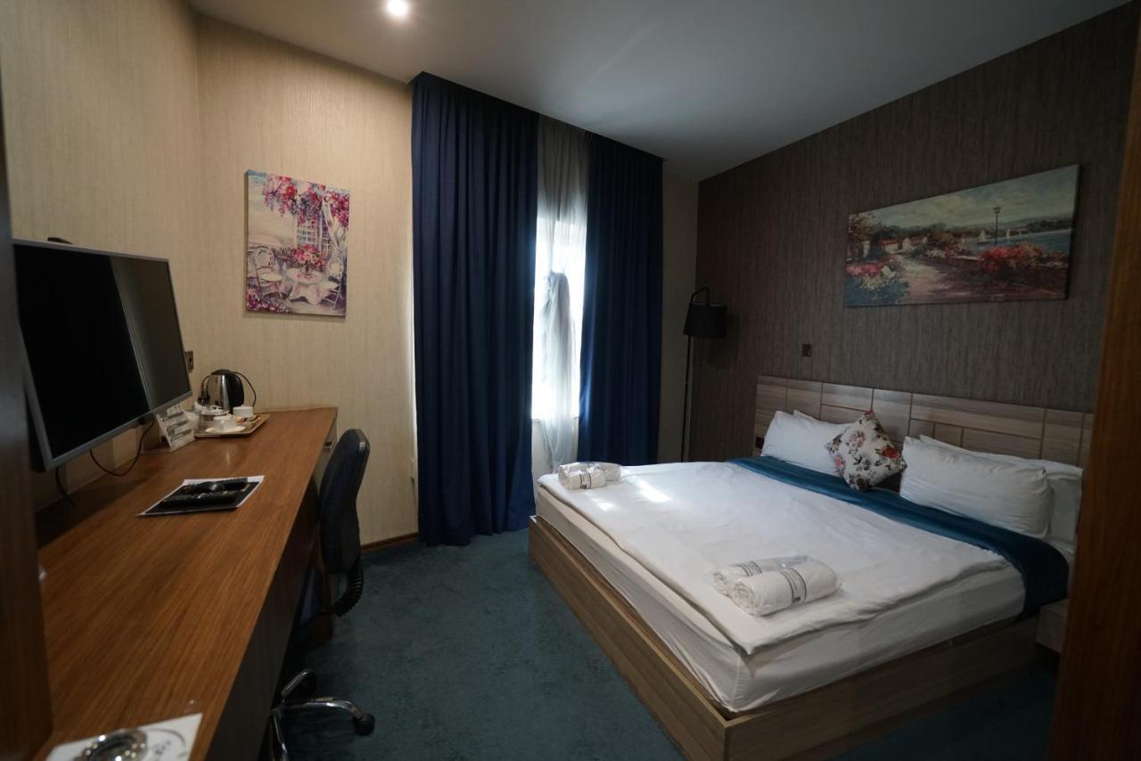 Gratus Hotel Erbil Buitenkant foto